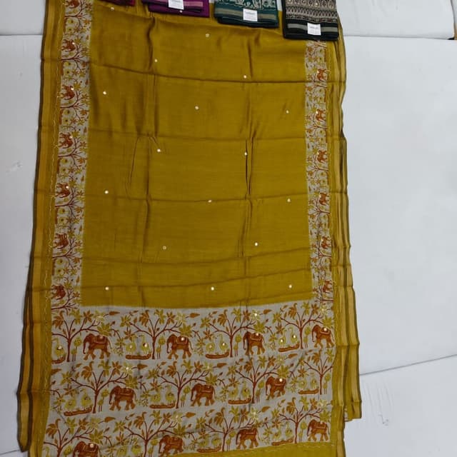 Mustard yellow, brown, beige, and gold accents Saree