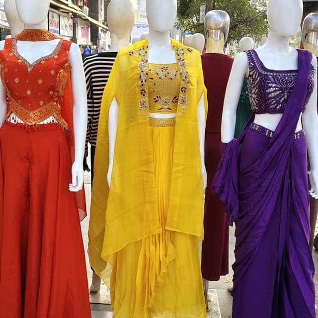 Yellow, with hints of gold and various colors in the embroidery Sharara suit with cape