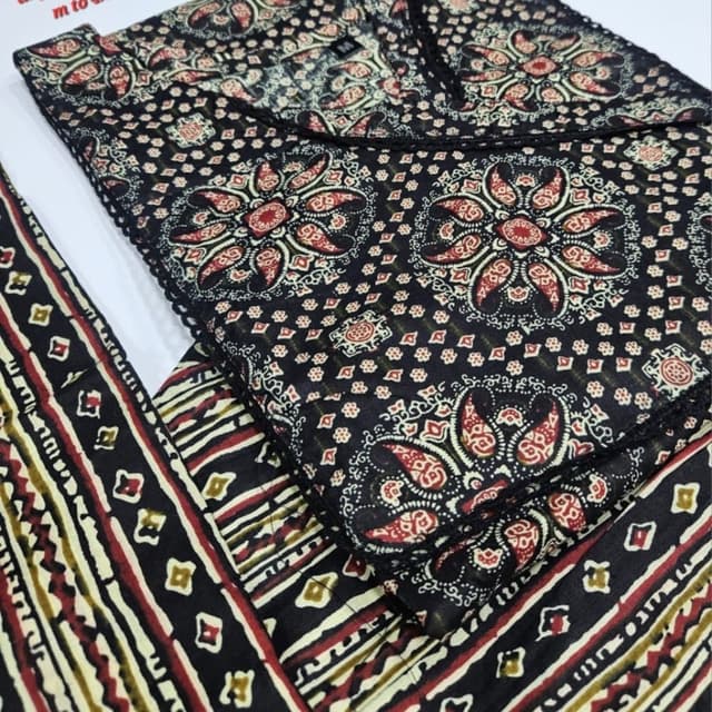 Black, Red, Beige, and Brown Dress or Dress Material