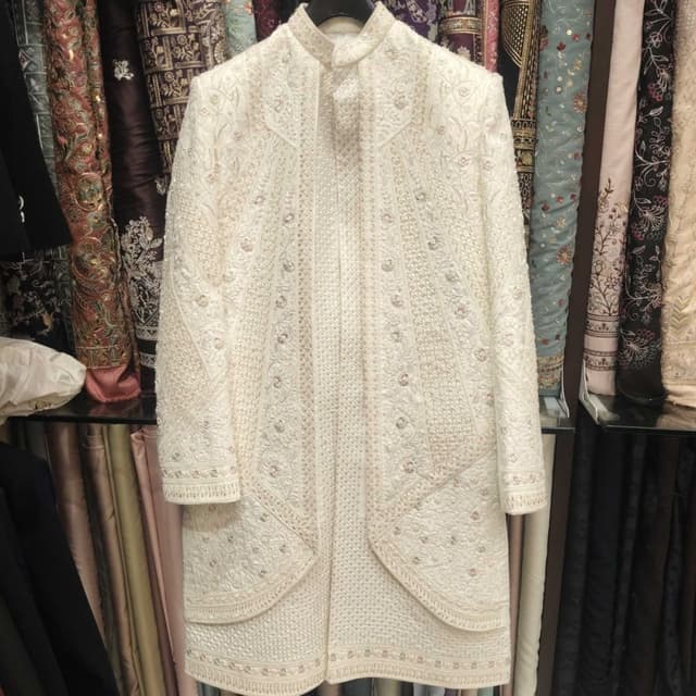 Ivory and subtle gold accents Sherwani