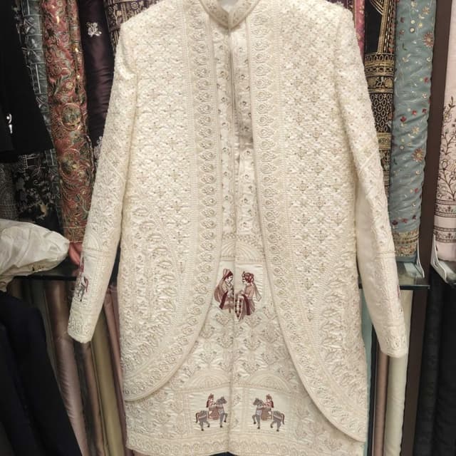 Ivory, with accents of Maroon and Beige Sherwani