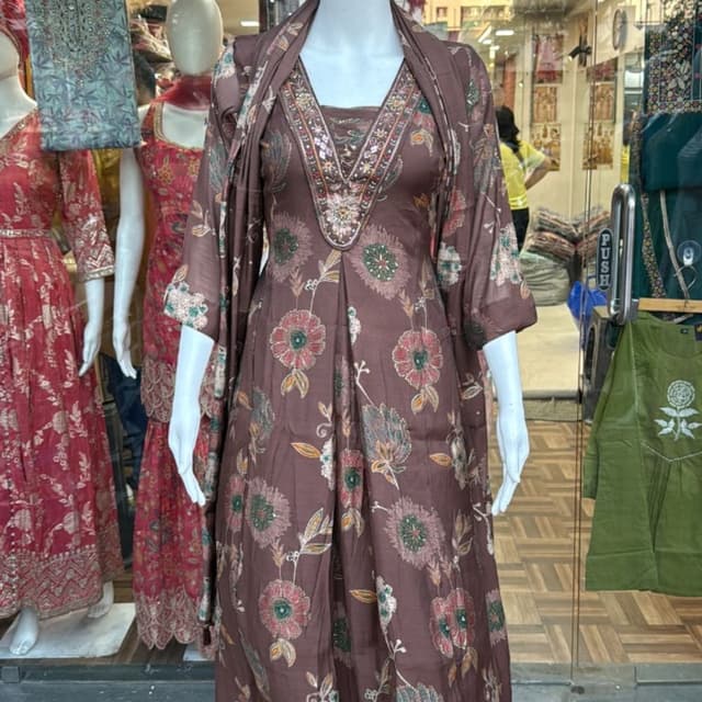 Brown, with floral patterns in shades of pink, green, and cream. Kurta Set with Jacket