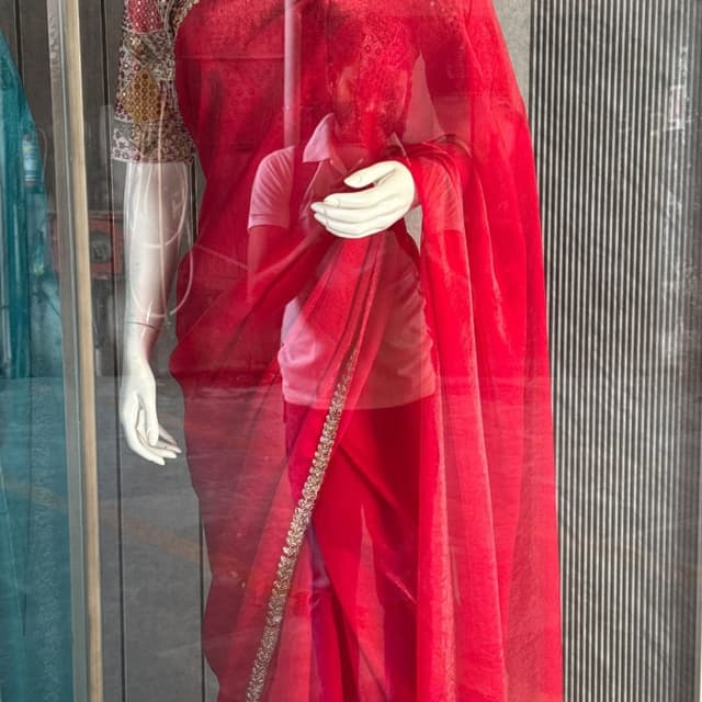 Red with multicoloured blouse Saree