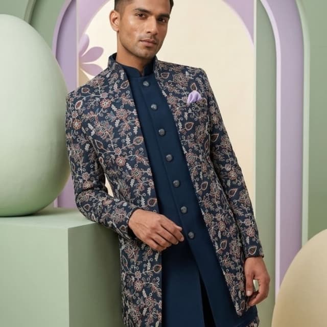 Navy blue with intricate floral patterns in shades of rust, beige, and white Sherwani Set