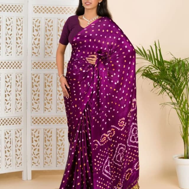Purple with white and yellow accents, gold border Saree