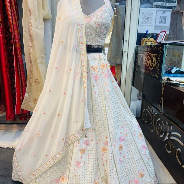 White with pink and orange floral accents Lehenga Choli