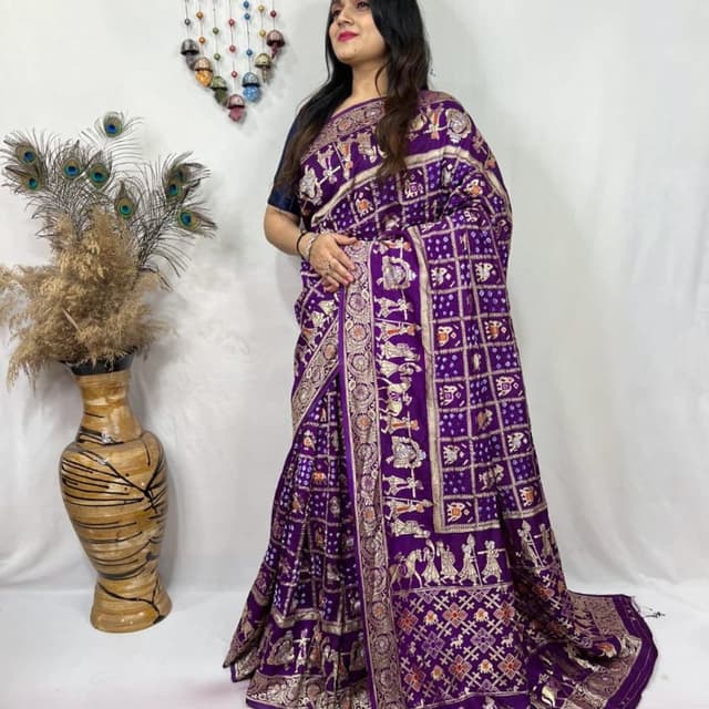 Deep Purple with Gold and Orange accents Saree