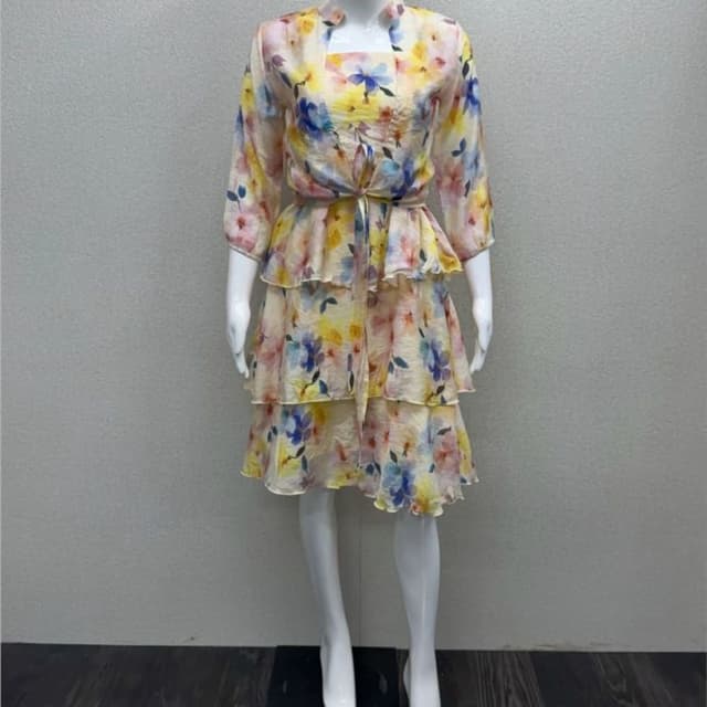 Multicolor floral print with yellow, blue, pink, and green hues on a light base Dress