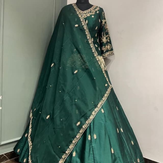 Deep Green with Gold Embellishments Lehenga Choli