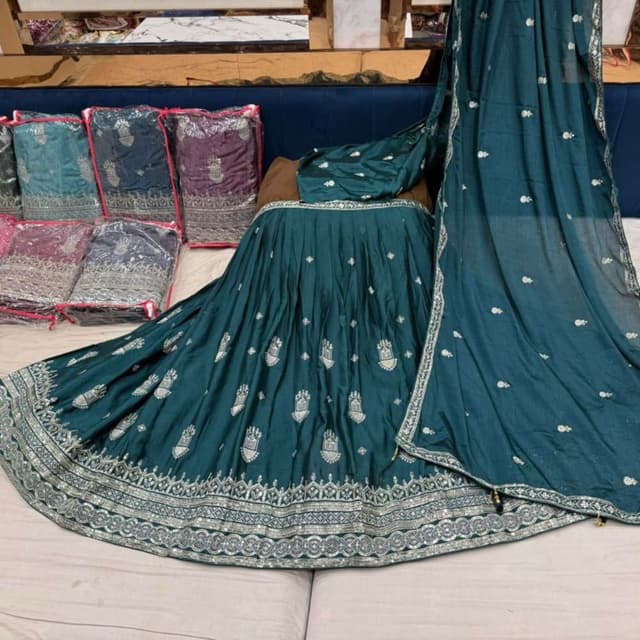 Teal with silver embellishments Lehenga Choli