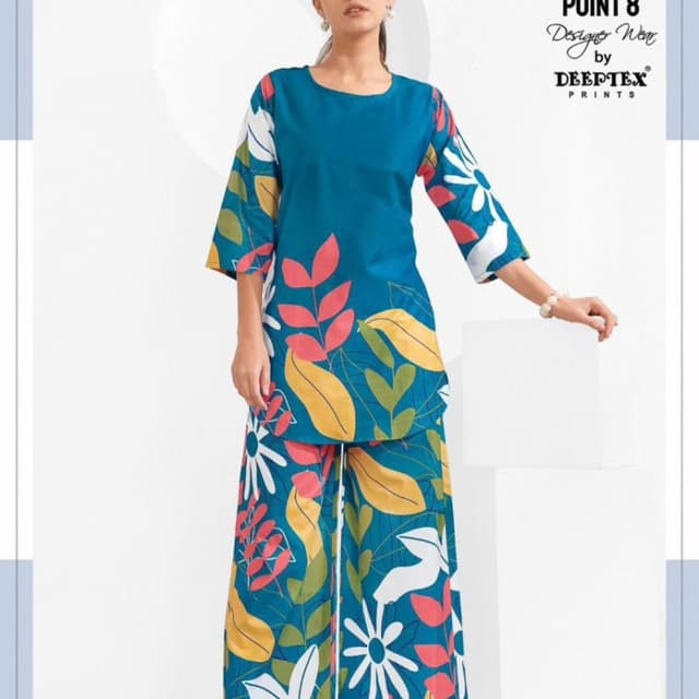 Teal blue with floral print in white, yellow, pink, and green Kurti and Palazzo set