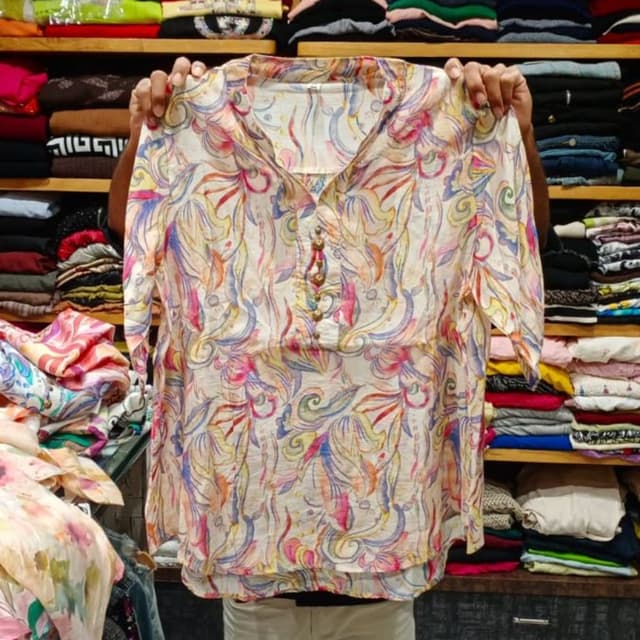 Off-white with multi-color abstract floral print (pink, blue, yellow, orange, green) Blouse