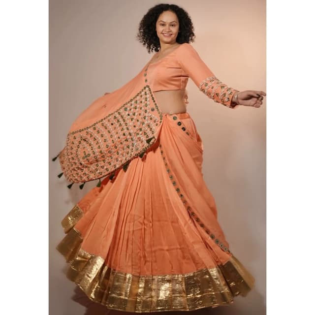 Peach with Gold and Green embellishments Lehenga Choli