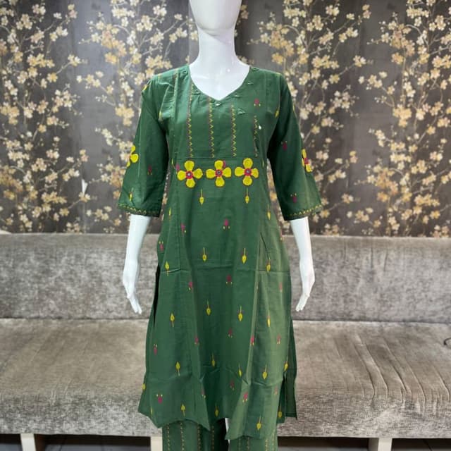 Green with yellow and pink accents Kurta and Palazzo Set