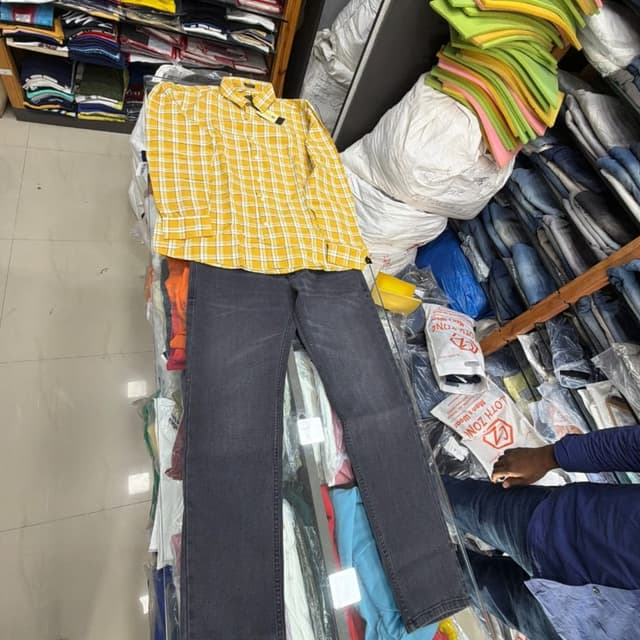 Yellow and white plaid shirt, charcoal gray jeans Shirt and Jeans