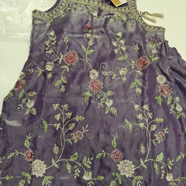 Purple with floral embroidery in red, green, and cream, and a silver border. Lehenga Choli Top (Choli)