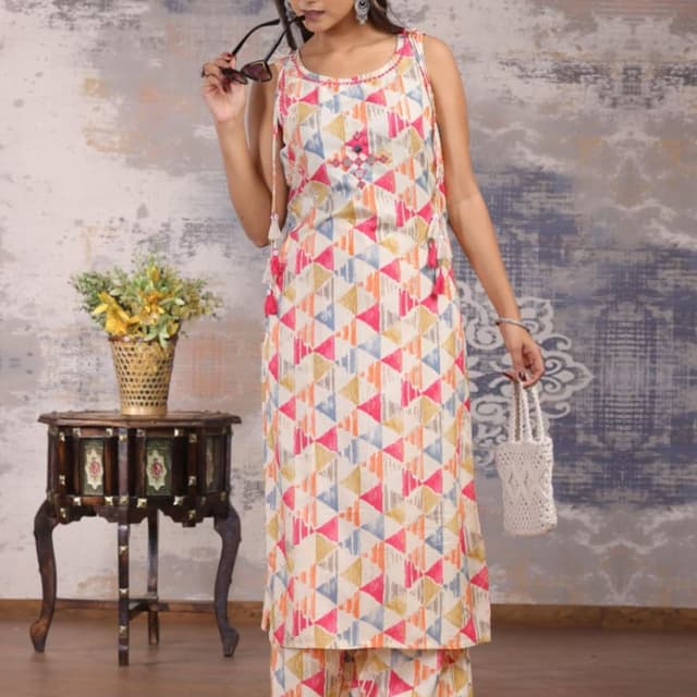 Cream with geometric patterns in pink, yellow, blue, and orange Kurta and Palazzo Set