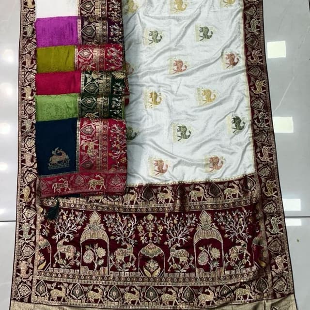 White with gold and maroon accents Saree