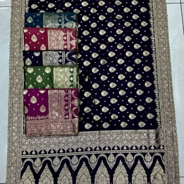 Deep purple with intricate gold motifs Saree