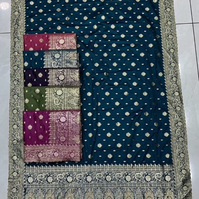 Teal with gold accents, also showing samples in deep pink, navy blue, and olive green Saree