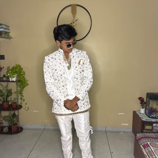 White with floral print in gold, blue, and grey tones Sherwani set