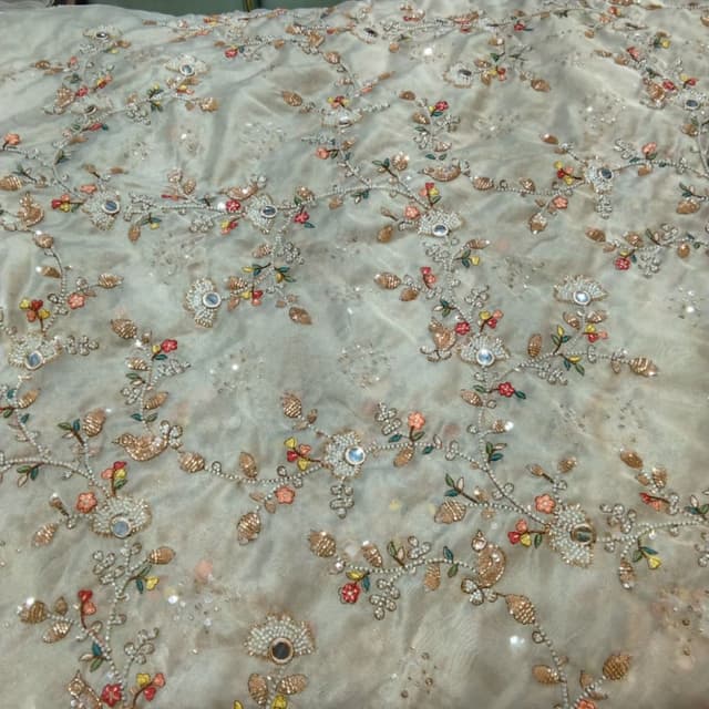 Cream with multicolor floral embroidery and gold accents Fabric