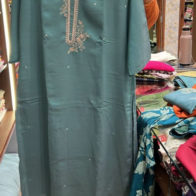 Teal green with subtle embroidery in beige and gold Kurta