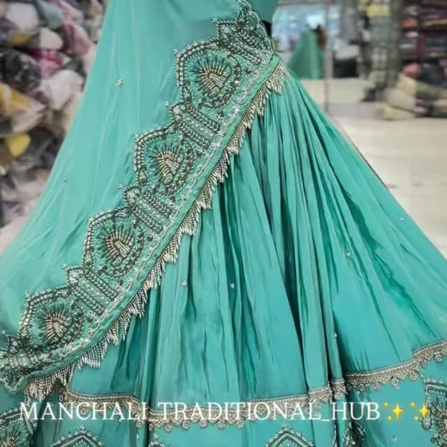 Teal with silver and green embellishments Lehenga Choli Set