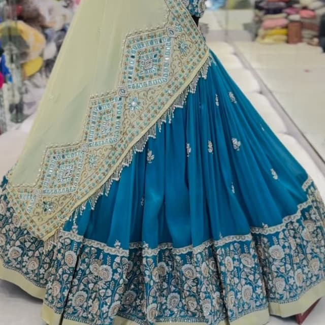 Teal blue, cream, gold, silver, light yellow Lehenga Choli
