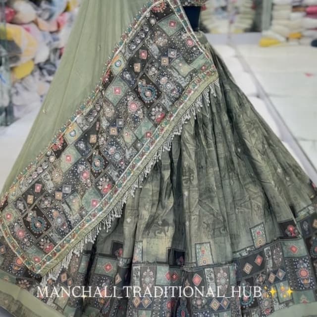 Sage green with multi-color geometric and floral prints in shades of black, pink, teal, and cream Lehenga Choli with Dupatta