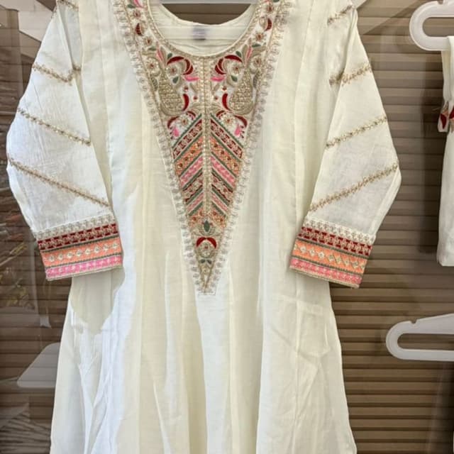 Off-white with multi-colored embroidery (pink, orange, green, gold, maroon) Kurti