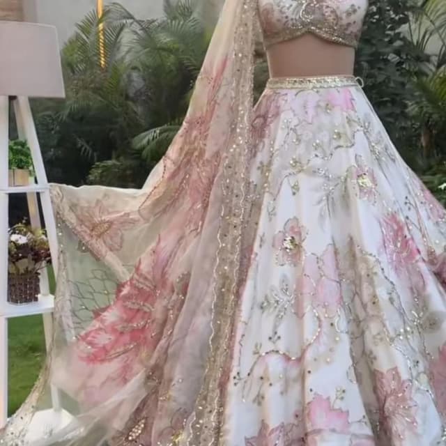 White with pink floral print and gold embellishments Lehenga Choli with Dupatta