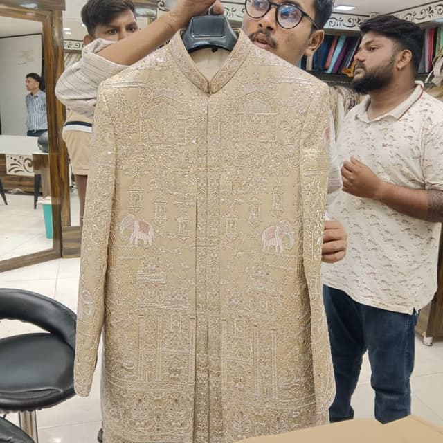Beige with intricate silver and subtle pink embroidery Sherwani