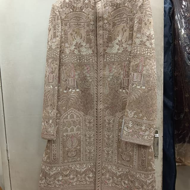 Beige with intricate white and pink embroidery Sherwani