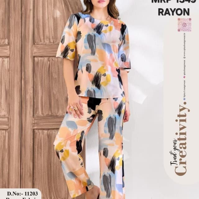 Multi-colored with shades of peach, yellow, light blue, gray, and black abstract brush strokes. Pajama Set
