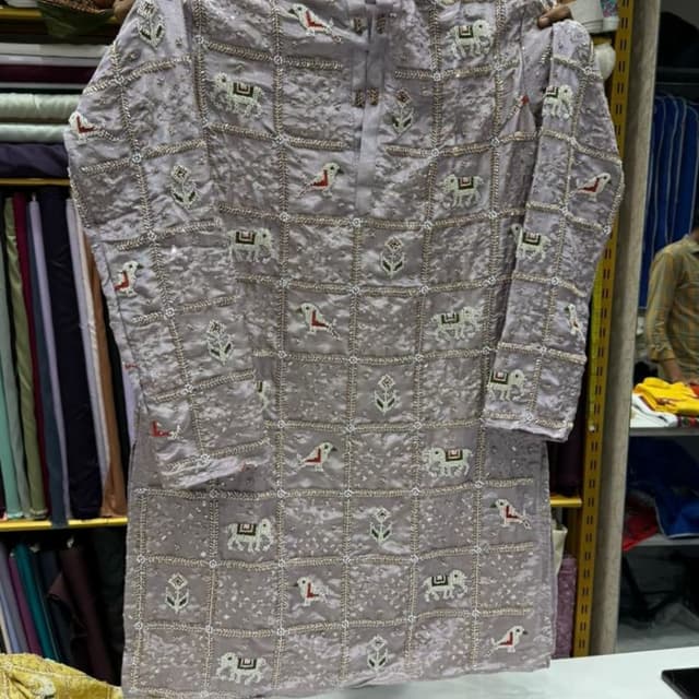 Light Purple/Lavender with white, green, and red accents Kurta