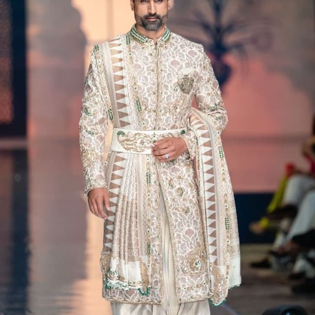 Cream, beige, gold, and green accents Sherwani with churidar and dupatta