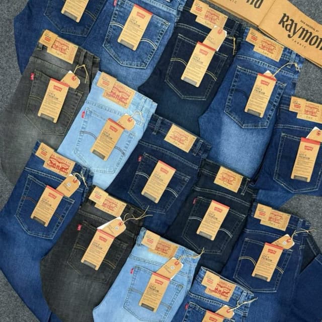 Various shades of blue denim, including dark indigo, medium blue, light blue, and charcoal gray Jeans