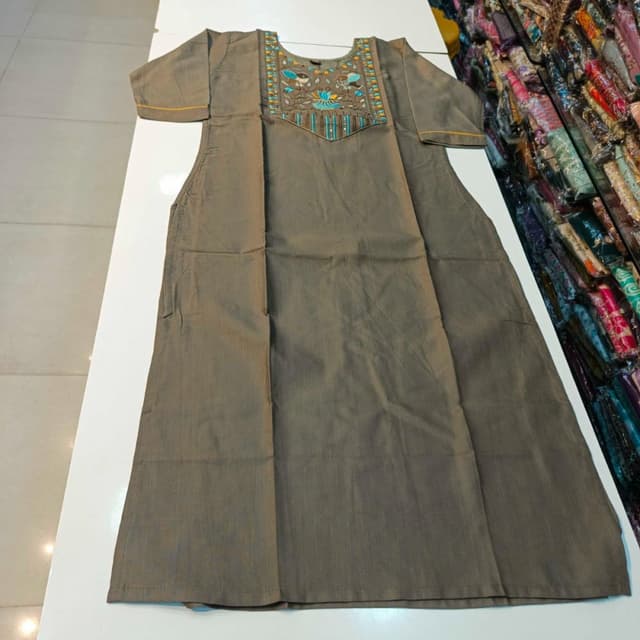 Brown with blue, yellow, and white embroidery Kurti
