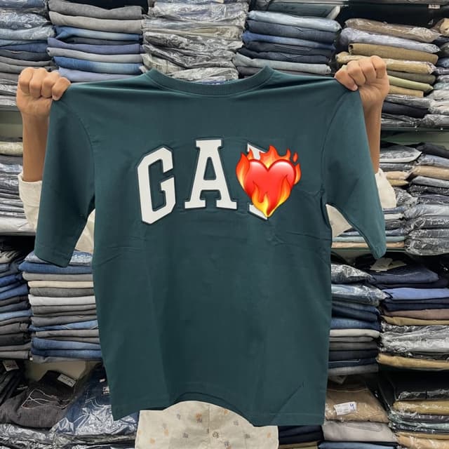 Teal green with white and fiery red/orange accents T-shirt