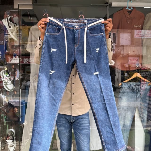 Blue denim with white accents Jeans