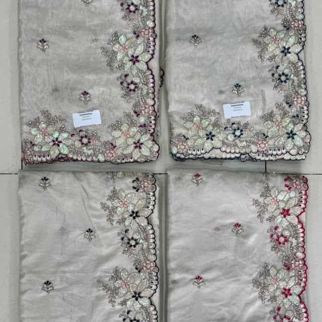 Ivory with multicolor floral embroidery Saree