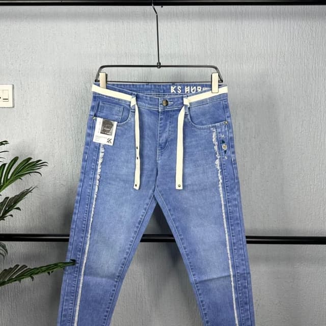 Blue denim with cream accents Jeans