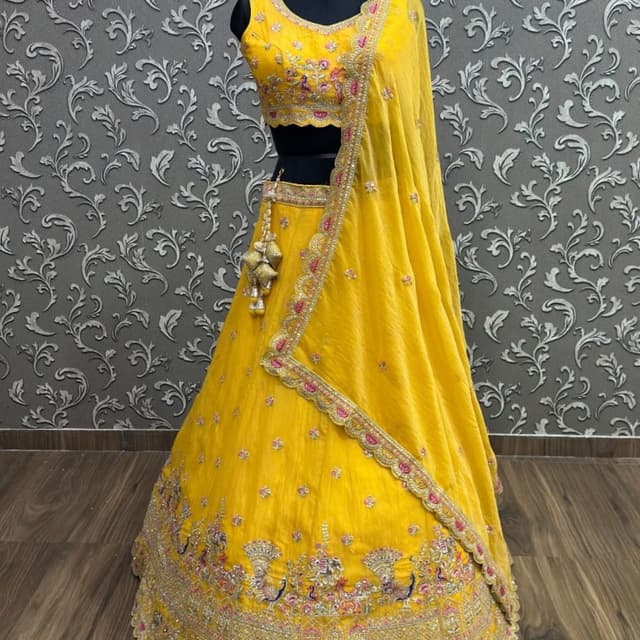 Mustard yellow with accents of pink, green, and blue Lehenga Choli