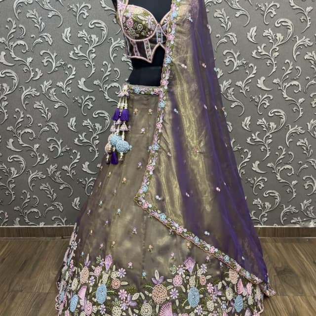 Deep purple, muted metallic olive, pastel pink, and baby blue Lehenga Choli