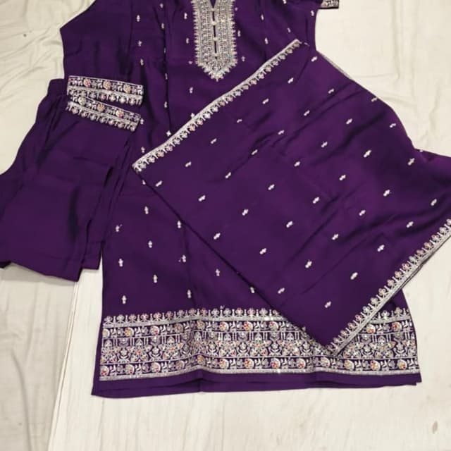 Deep purple base with silver and multi-colored thread accents Kurti with pants set