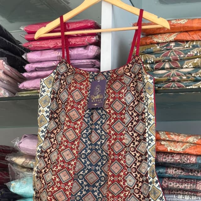 Deep red, dark blue, cream, and mustard yellow Blouse