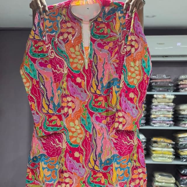 Multi-colored with dominant hot pink, orange, green, teal, and yellow Kurta