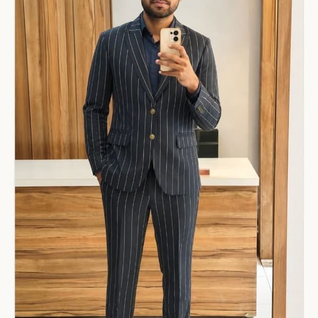 Navy blue base with white vertical pinstripes Suit