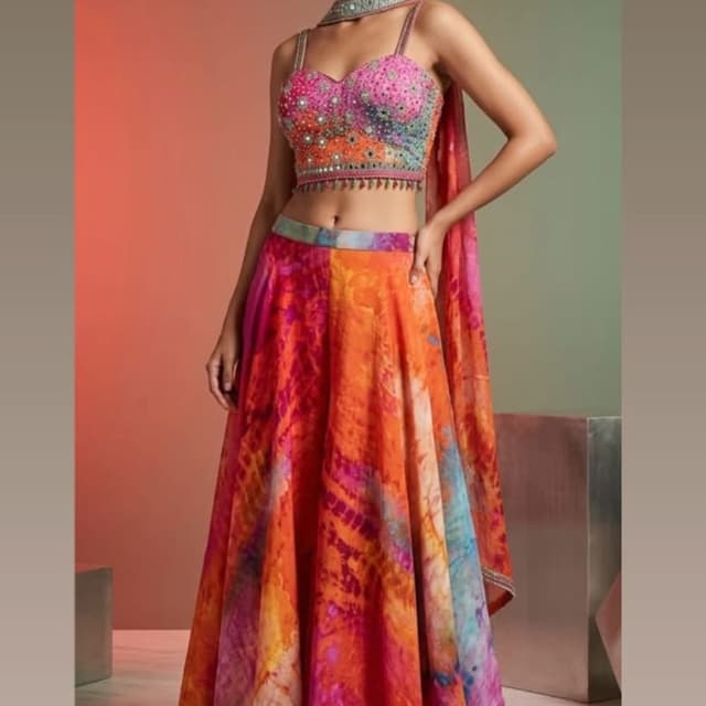Multi-colored, shades of pink, orange, and blue Lehenga Choli